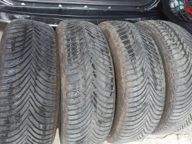 Гуми Зимни 215/65R17, снимка 2 - Гуми и джанти - 46939349