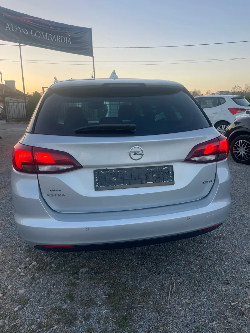 Opel Astra 1.6 Sports Tourer, снимка 4 - Автомобили и джипове - 47680718