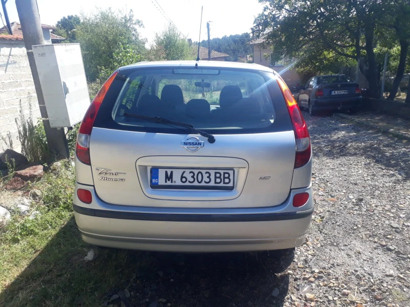 Nissan Almera tino, снимка 11 - Автомобили и джипове - 47732446