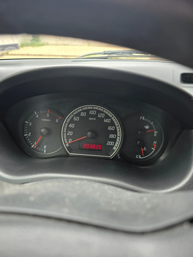 Suzuki Swift 1.3, снимка 14 - Автомобили и джипове - 52393575
