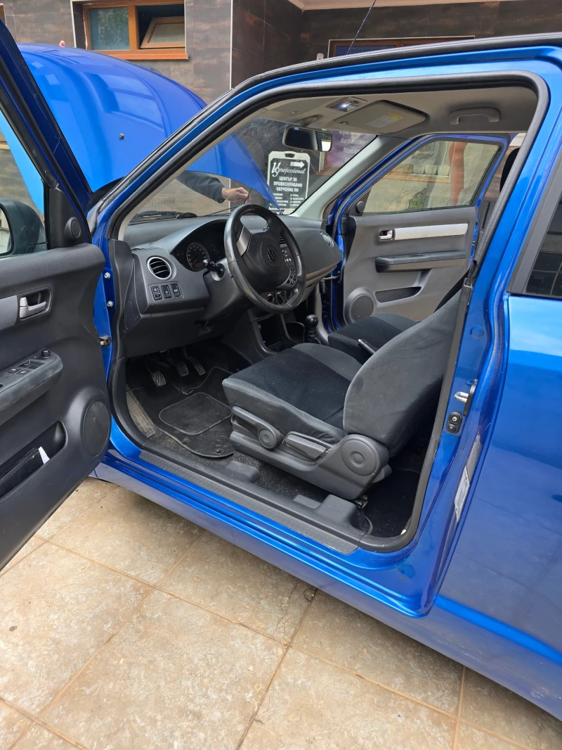 Suzuki Swift 1.3, снимка 9 - Автомобили и джипове - 52393575