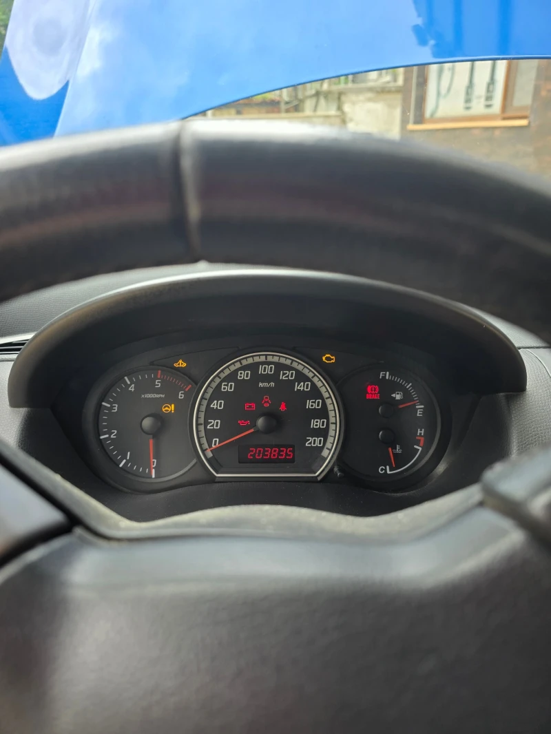 Suzuki Swift 1.3, снимка 13 - Автомобили и джипове - 52393575