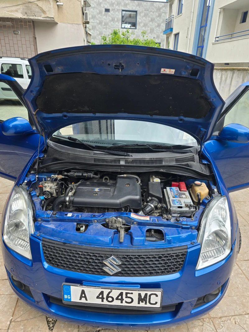 Suzuki Swift 1.3, снимка 11 - Автомобили и джипове - 52393575
