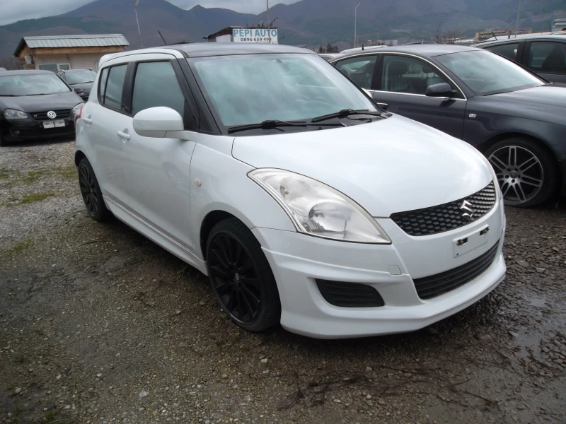 Suzuki Swift 1.3i-90ks TUNING SPORT, снимка 2 - Автомобили и джипове - 53283858