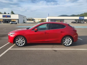 ������ Mazda 3
