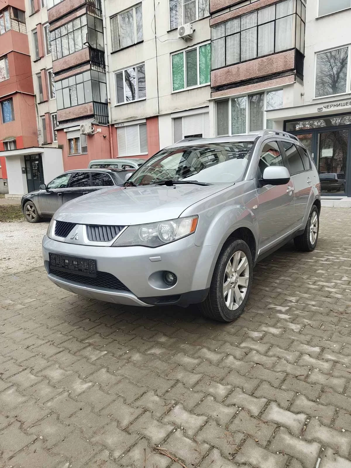 Mitsubishi Outlander 2.4 Автоматик/Газ 4х4/кожа, снимка 2 - Автомобили и джипове - 54041705