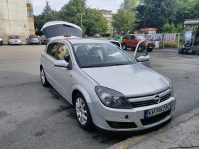 Opel Astra, снимка 1 - Автомобили и джипове - 45626704