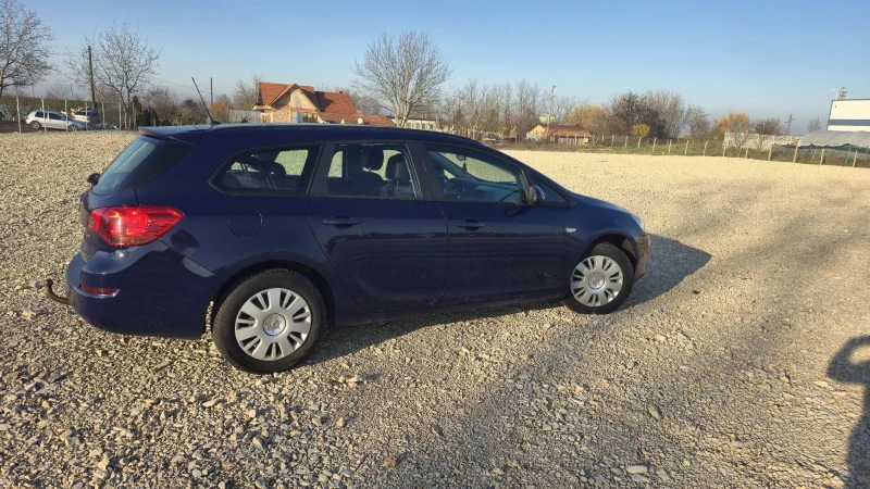 Opel Astra Sports Tourer, снимка 4 - Автомобили и джипове - 52738641