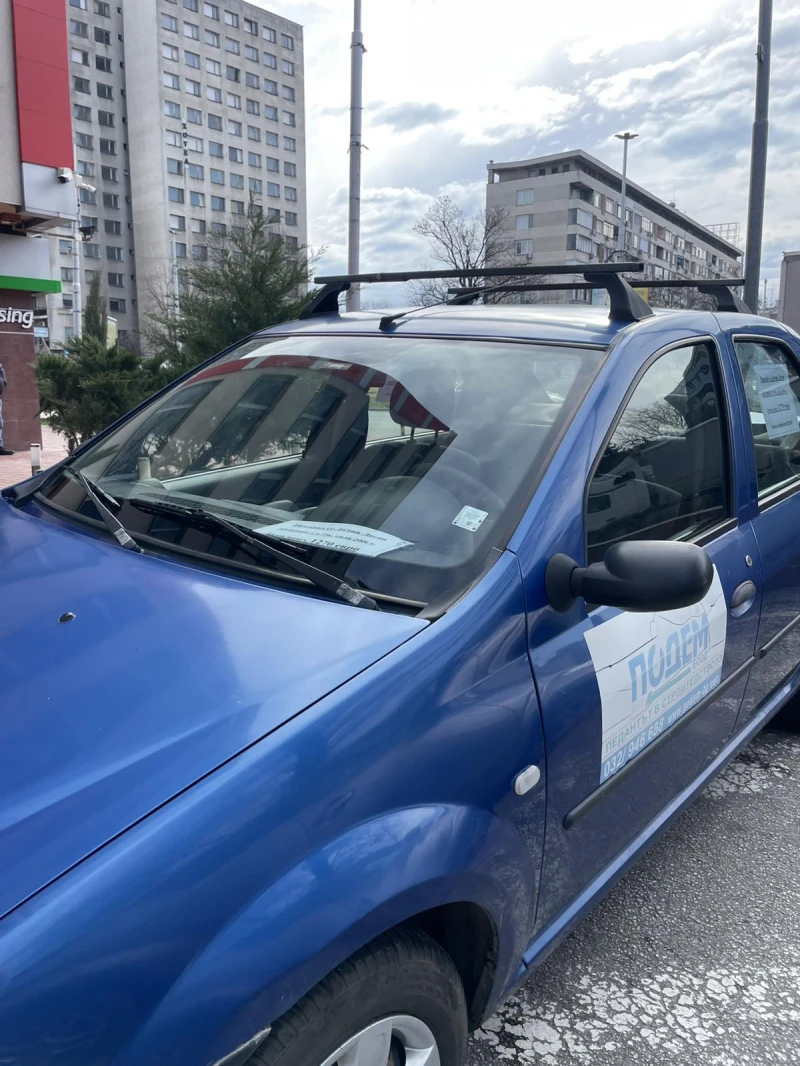 Dacia Logan, снимка 9 - Автомобили и джипове - 53520194