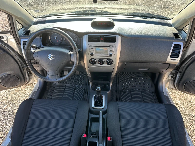 Suzuki Liana 1.4 DDIS 90kc, снимка 11 - Автомобили и джипове - 48188943