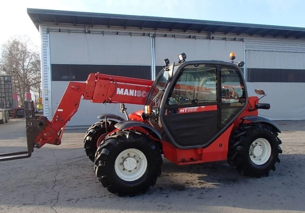 Телескопични товарачи Manitou MT 932 A - изображение 2