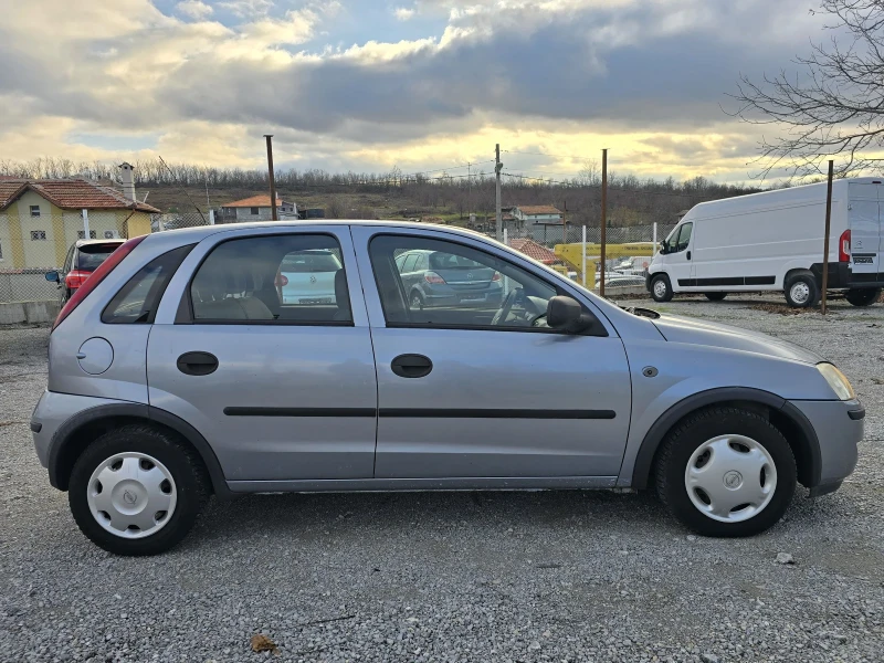 Opel Corsa 1.2 i 75 К.С. КЛИМАТИК, снимка 6 - Автомобили и джипове - 48324645