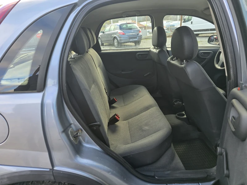 Opel Corsa 1.2 i 75 К.С. КЛИМАТИК, снимка 10 - Автомобили и джипове - 48324645