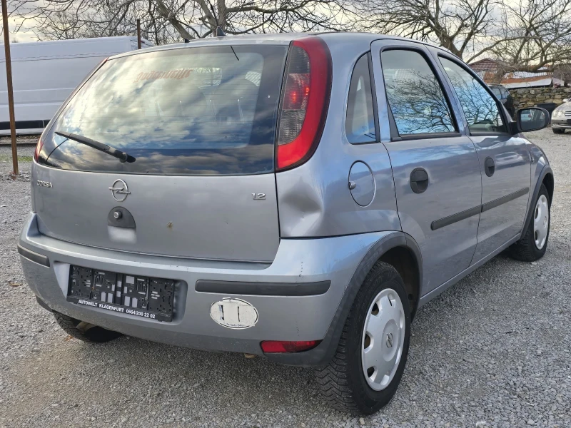 Opel Corsa 1.2 i 75 К.С. КЛИМАТИК, снимка 4 - Автомобили и джипове - 48324645