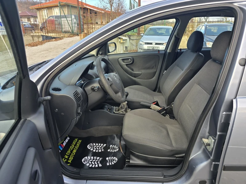 Opel Corsa 1.2 i 75 К.С. КЛИМАТИК, снимка 8 - Автомобили и джипове - 48324645