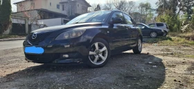 Mazda 3, снимка 1