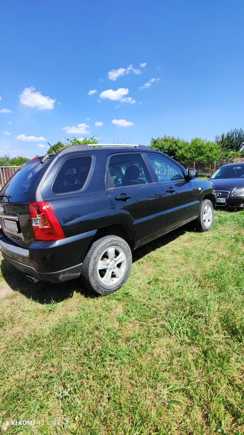 Kia Sportage, снимка 2 - Автомобили и джипове - 52325181
