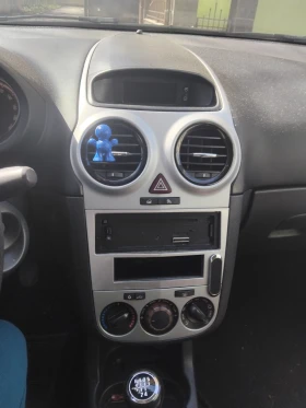 Opel Corsa 1.2 80к.с , снимка 11