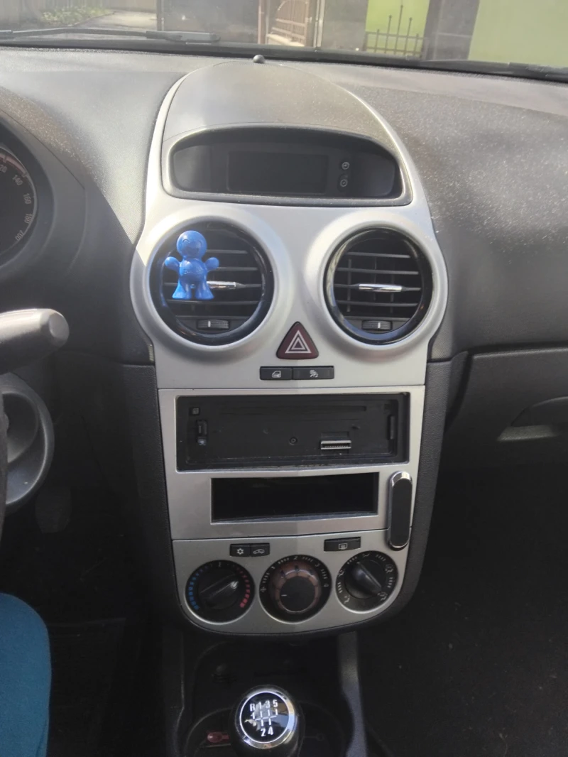 Opel Corsa 1.2 80к.с , снимка 11 - Автомобили и джипове - 53582495