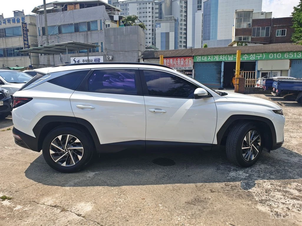 Hyundai Tucson 1.6 Turbo Premium 4x4* ПОДГРЕВ* ОБДУХВАНЕ* КАМЕРА*, снимка 2 - Автомобили и джипове - 55081340