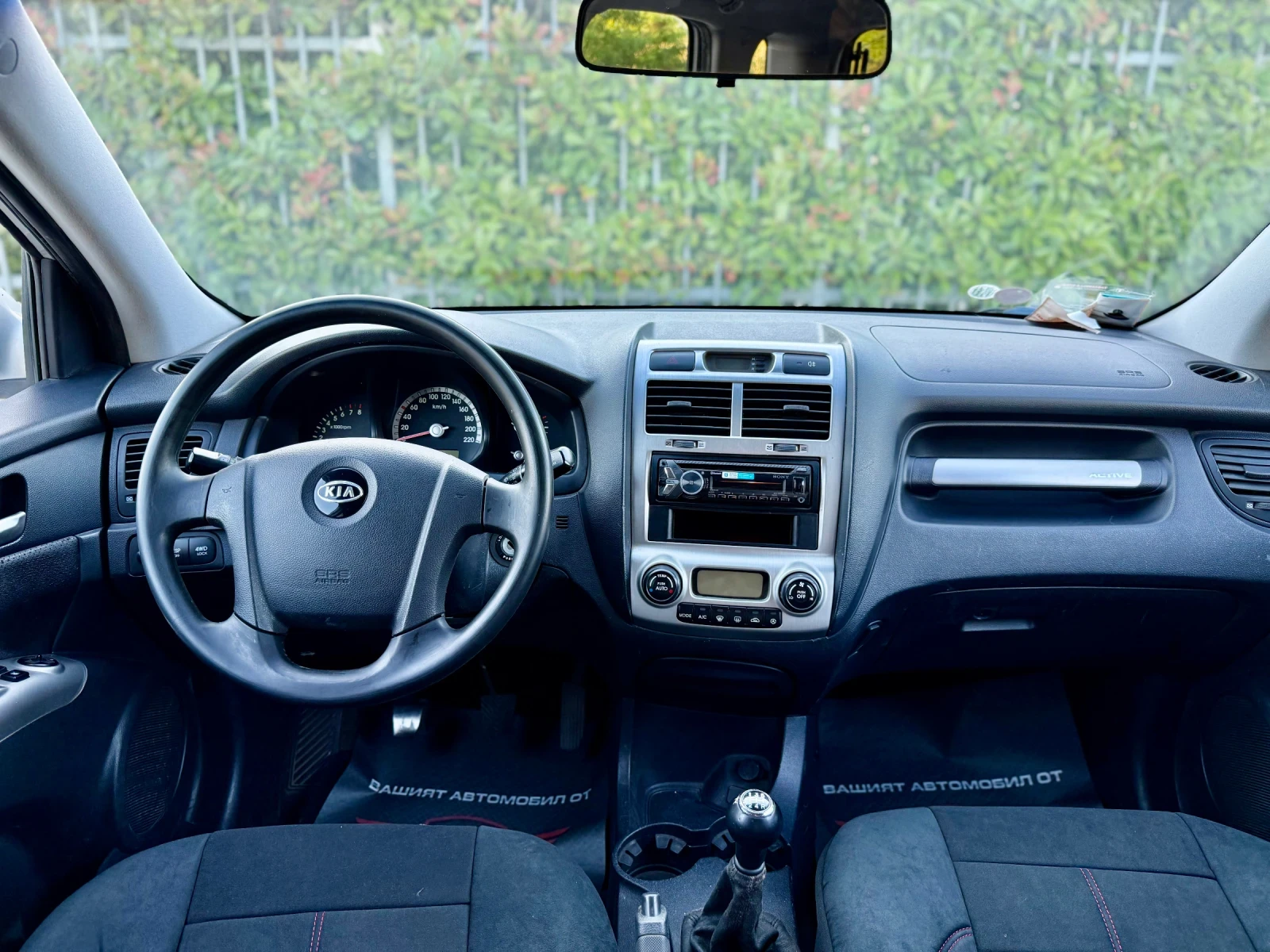 Kia Sportage 2.0i/ ГАЗ/ 4X4/ FACE/, снимка 9 - Автомобили и джипове - 54839596