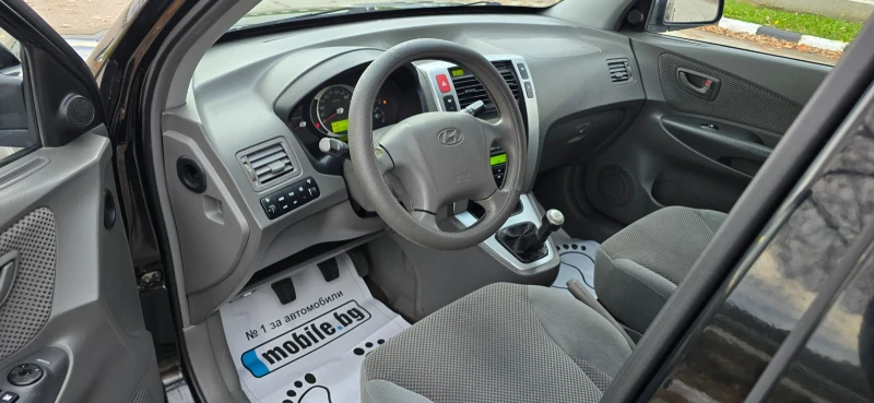 Hyundai Tucson 2.0 141hp 4x4, снимка 13 - Автомобили и джипове - 52367692