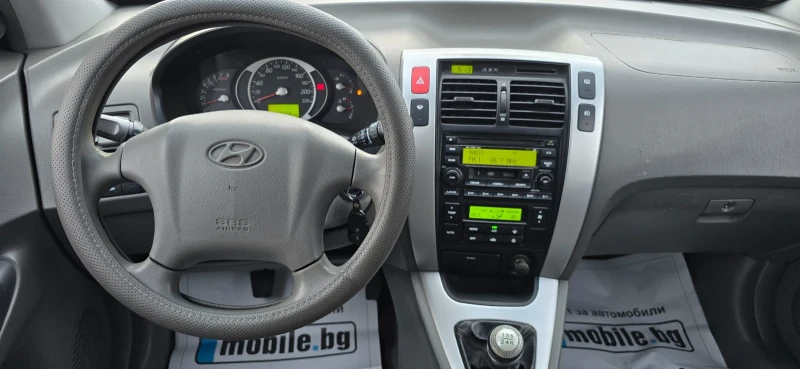 Hyundai Tucson 2.0 141hp 4x4, снимка 10 - Автомобили и джипове - 52367692