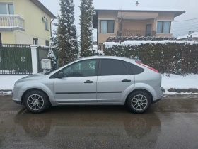     Ford Focus 1.6.- -  