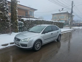     Ford Focus 1.6.- -  