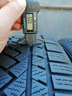 Гуми Зимни 215/65R16, снимка 8