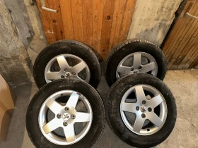 Гуми с джанти Bridgestone 195/65R15, снимка 1 - Гуми и джанти - 49261922