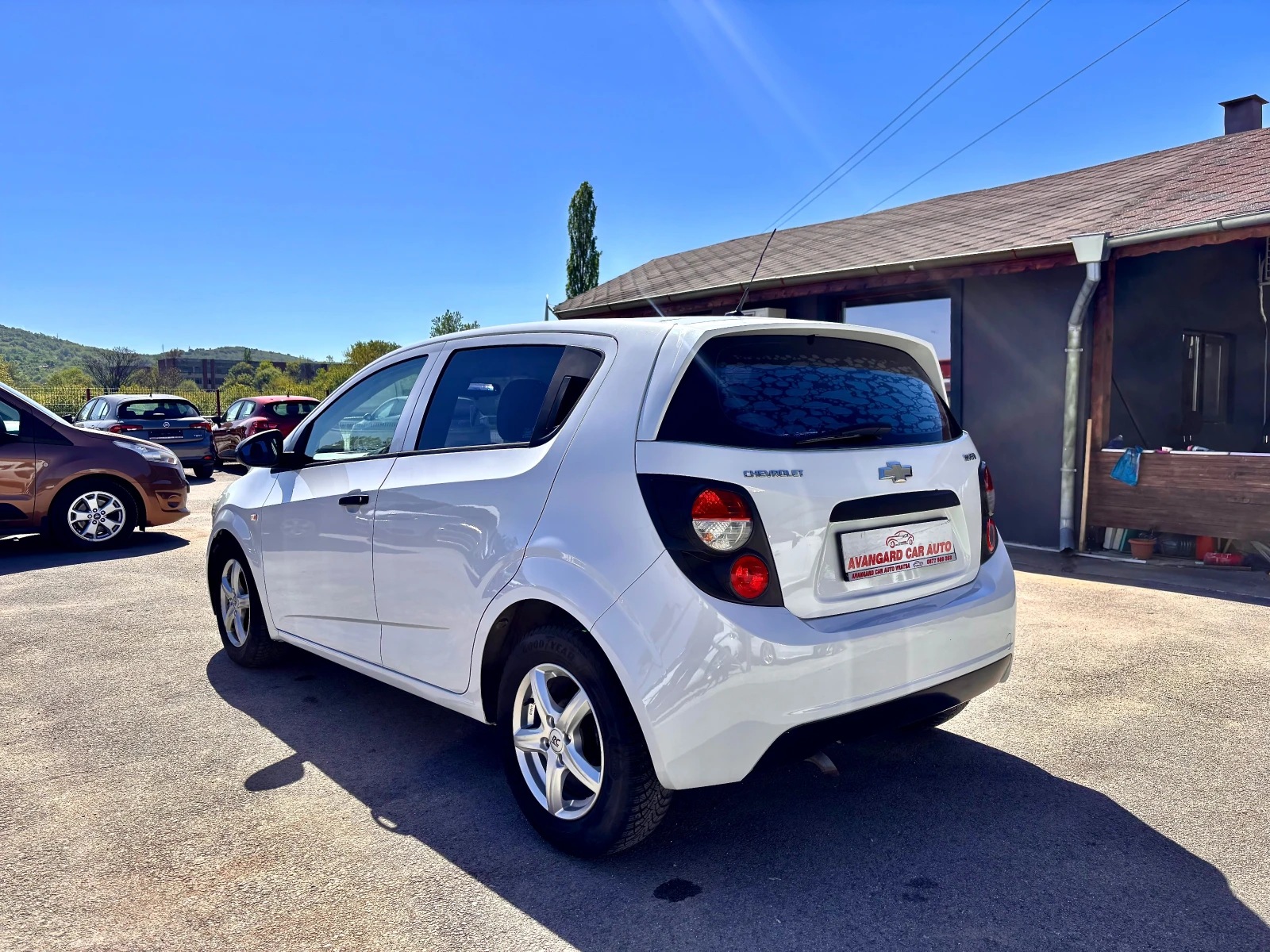 Chevrolet Aveo, снимка 7 - Автомобили и джипове - 54330942