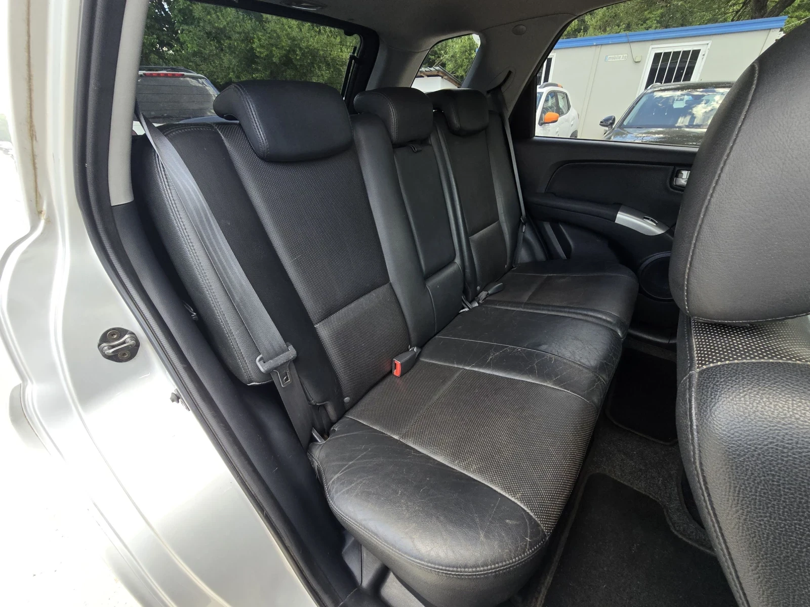 Kia Sportage 2.0D 112к.с 4х4 Кожа Бавни , снимка 15 - Автомобили и джипове - 54959268