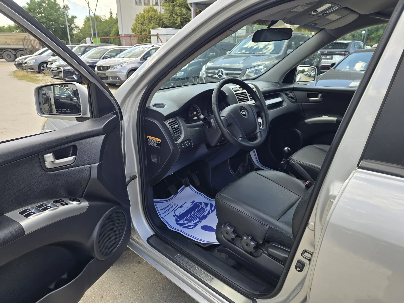 Kia Sportage 2.0D 112к.с 4х4 Кожа Бавни , снимка 11 - Автомобили и джипове - 54959268