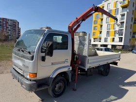 Nissan Capstar Бордови с кран, снимка 2