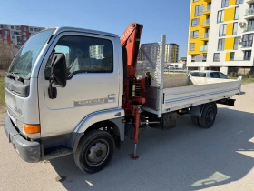 Nissan Capstar Бордови с кран | Auto.bg — изображение 8