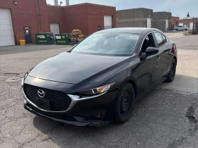 ������ Mazda 3