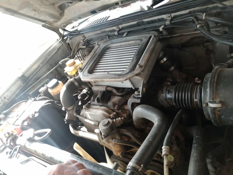 Nissan Navara 2.5 Di, снимка 9 - Автомобили и джипове - 53086644