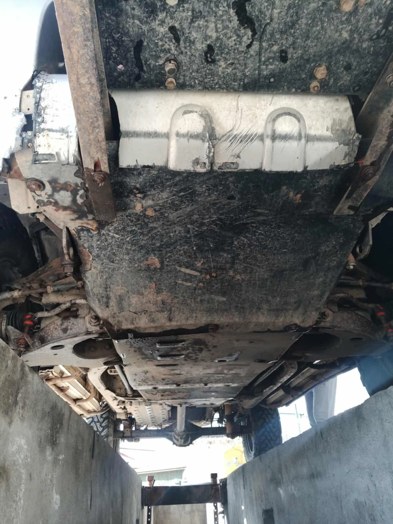 Nissan Navara 2.5 Di, снимка 6 - Автомобили и джипове - 53086644