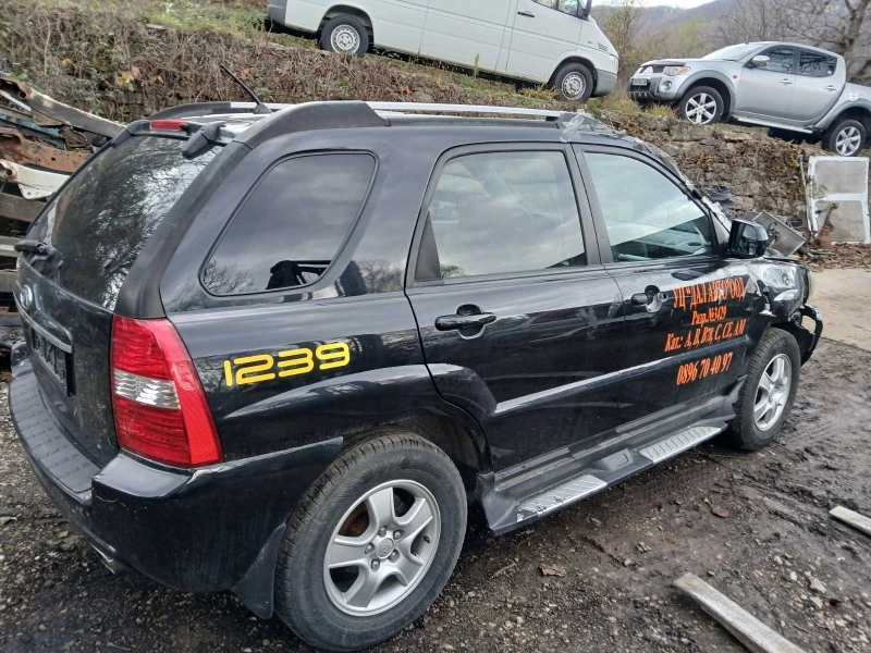 Kia Sportage 2.0crdi, снимка 4 - Автомобили и джипове - 52527550