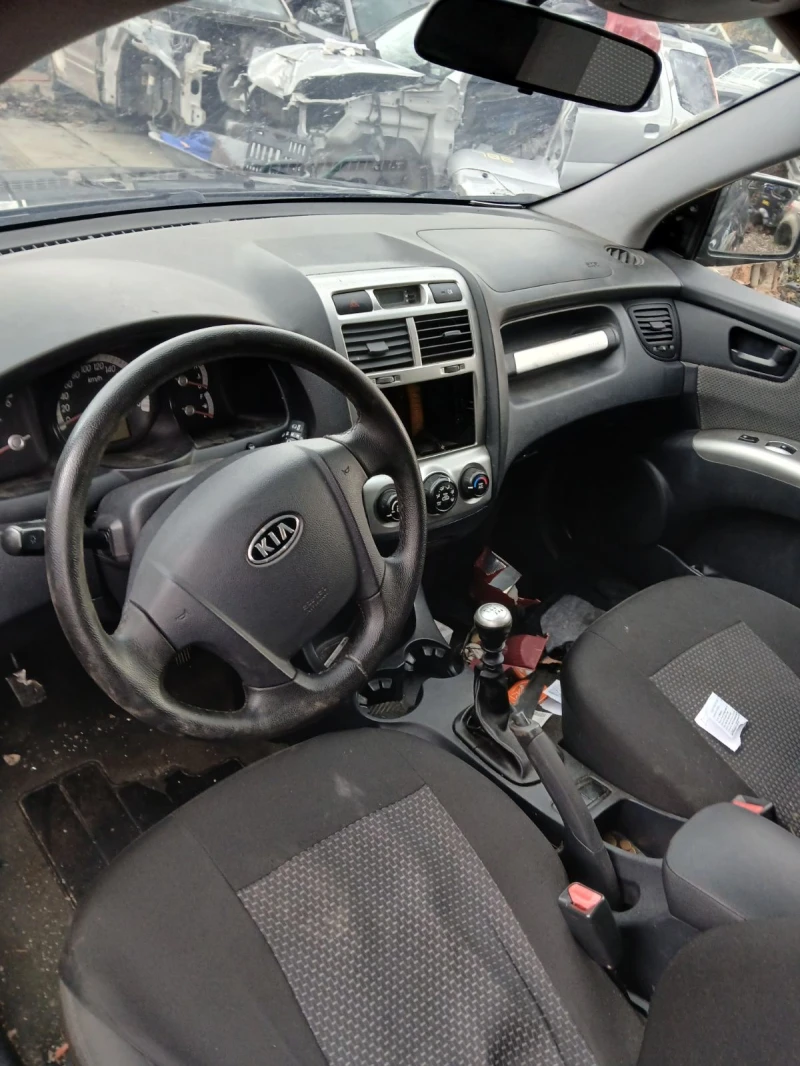 Kia Sportage 2.0crdi, снимка 5 - Автомобили и джипове - 52527550