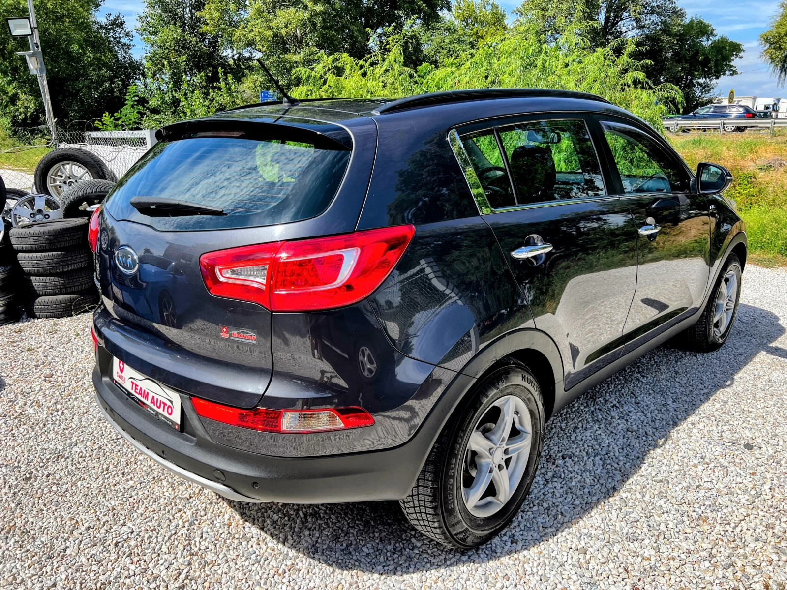 Kia Sportage 2.0i AUTOMATIC 4X4 SWISS EDITION, снимка 5 - Автомобили и джипове - 56084721