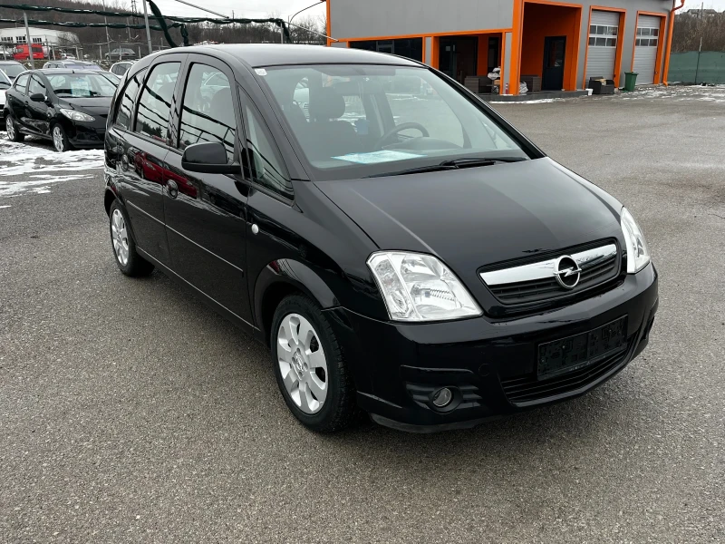 Opel Meriva 1.4i Facelift , снимка 7 - Автомобили и джипове - 53234486