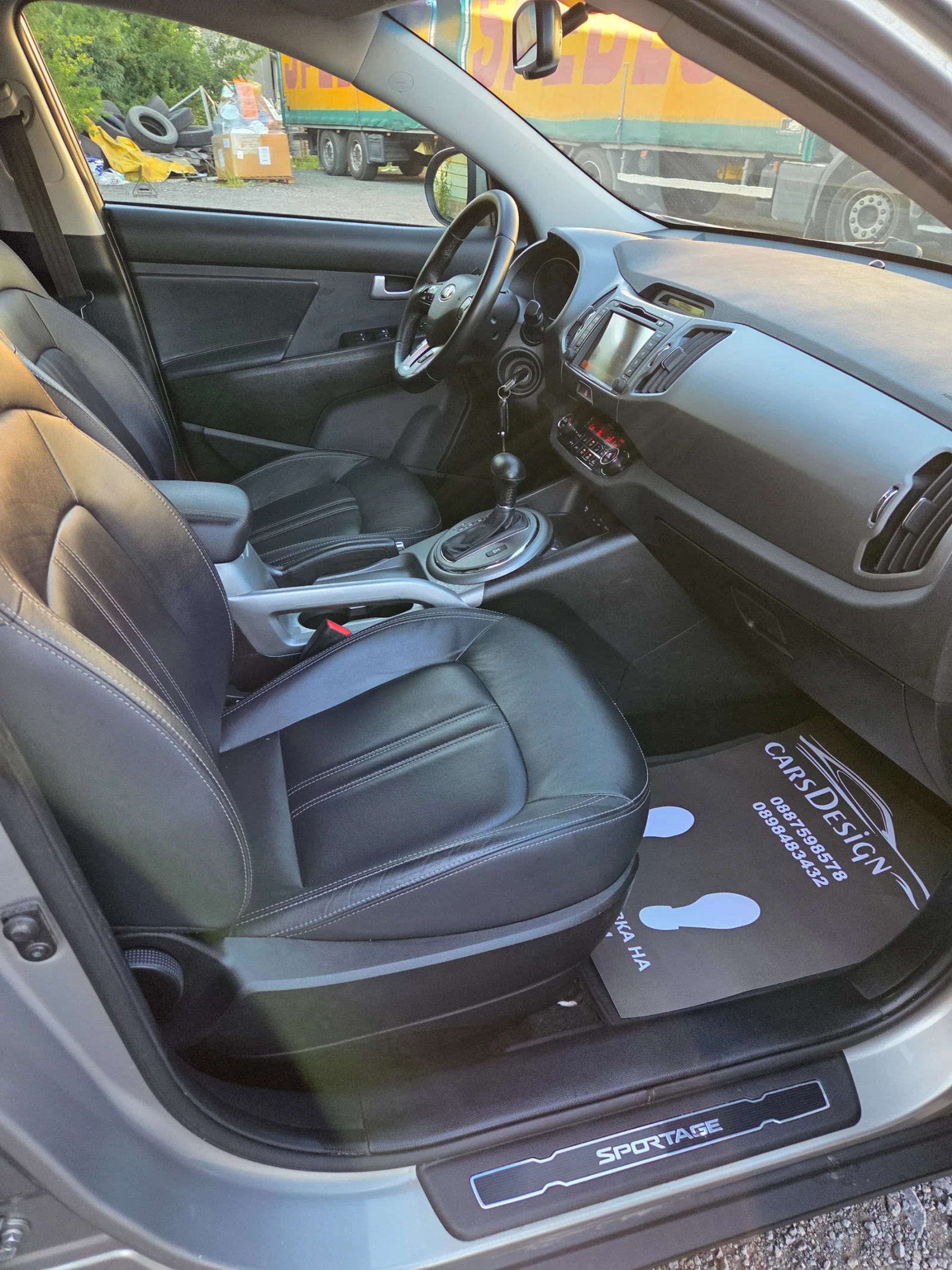 Kia Sportage 2.0CRDI-SPIRIT 4x4, снимка 11 - Автомобили и джипове - 55646133