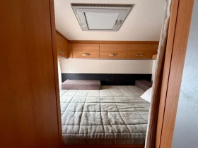 Кемпер Renault Knaus SunTraveller 🇨🇭, снимка 14 - Каравани и кемпери - 53322371