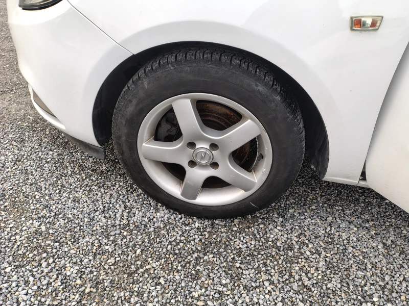 Opel Corsa 1.3 Dizel, снимка 15 - Автомобили и джипове - 53089726