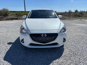 Обява за продажба на Mazda 2 ВНОС ШВЕЙЦАРИЯ АВТОМАТ 1.5 бензин  ~18 399 лв. - изображение 4 | Auto.bg Обява за продажба на Mazda 2 ВНОС ШВЕЙЦАРИЯ АВТОМАТ 1.5 бензин  ~18 399 лв. - изображение 4