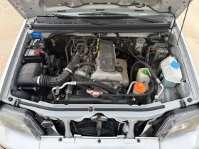 Suzuki Jimny 1.3/62кс 4х4 климатик 88000км Сервизни документи , снимка 14