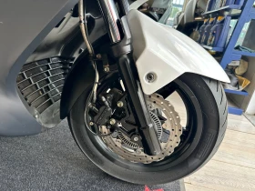 Kymco Downtown 300i 06.2010г., снимка 11