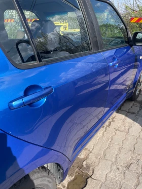 Suzuki Swift 1.3 4x4, снимка 13